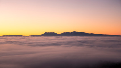 Fototapeta na wymiar sunrise with a sea of clouds and Montseny
