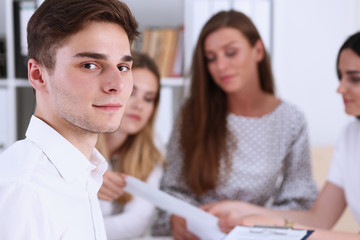 Obraz premium Handsome smiling businessman in suit portrait