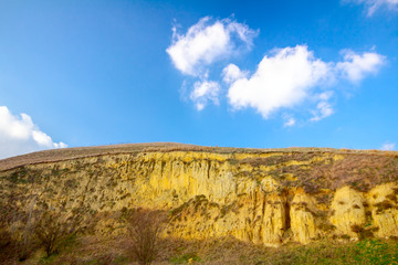 Erosion of rugged sandy cliffs