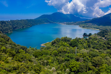 Aerial view of a beautiful lake inside an old volcanic caldera (Lake Buyan, Twin Lakes, Bali, Indonesia)