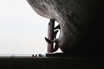 shipyard stern and propeller rudder ship moored in floating dry dock for maintennance and repair...