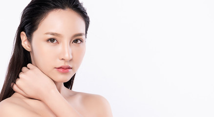 Naklejka premium Beautiful Young Asian Woman touching her body with fresh Healthy Skin, isolated on white background, Beauty Cosmetics and Facial treatment Concept.
