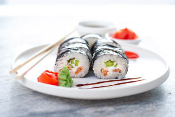 Sushi Rolls asian food stylish beautiful close up picture. Tasty delishes meals with rice and seafood on the white plate