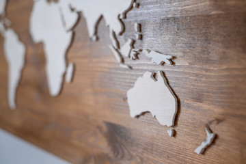 Handcrafted wooden world map with focus on Eastern Australia