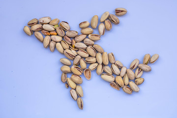 Pistachios isolated on a white background, top view.