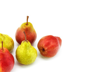 Five fresh ripe pears lie on a white background