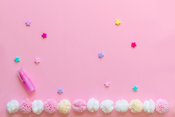 Bright children's hair accessories on a pink background. Pink text background with children's hair ornaments