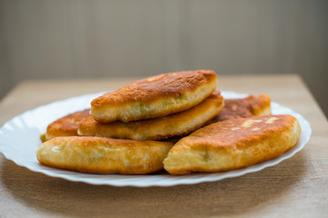 Homemade fried patty with eggs and dill