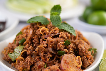 Spicy minced pork in a white plate.