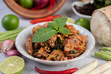 Spicy minced pork in a white plate.
