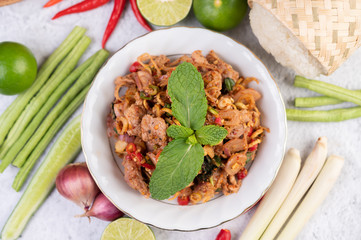 Spicy minced pork in a white plate.