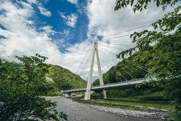 cable-stayed bridge Expressway among the mountains. mountain river