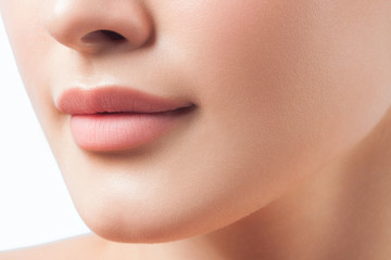 Anonymous portrait of young beautiful girl. Lips close up