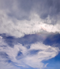 Nice clouds in blue sky with Iridescence