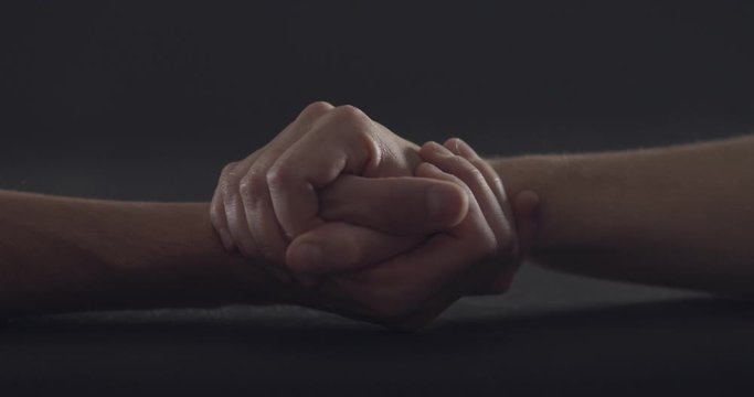 Two arms falling after an arm wrestling