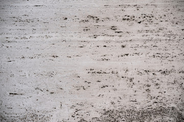 natural stone background with small holes and cracks