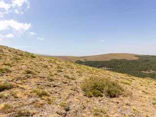 Fototapeta na wymiar Sierra Nevada mountain landscape with clouds