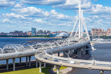 Saint Petersburg. Russia. Cable-stayed bridge over the Neva river. Bridges Of St. Petersburg. Rivers Of St. Petersburg. Big Obukhovsky bridge. Car traffic in the city. Transport infrastructure.
