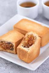 Pineapple cake pastry - Taiwanese famous sweet delicious dessert food with tea, close up, copy space design.