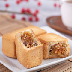 Pineapple cake pastry - Taiwanese famous sweet delicious dessert food with tea, close up, copy space design.