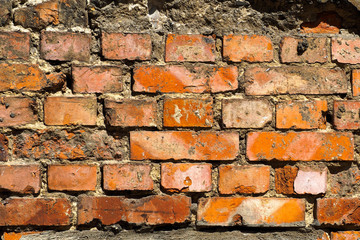 old brick wall close-up. texture of red old bricks on the building outside