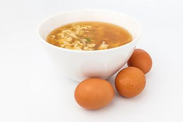 Egg soup on white background