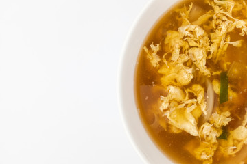 Egg soup on white background