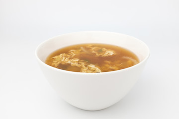 Egg soup on white background
