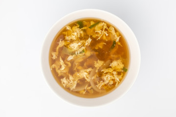 Egg soup on white background
