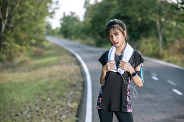 Woman standing Relax after exercise.