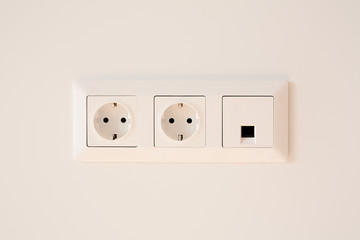 switch near power plugs on white