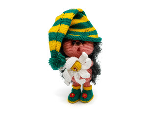 Knitted toy hedgehog on a white background