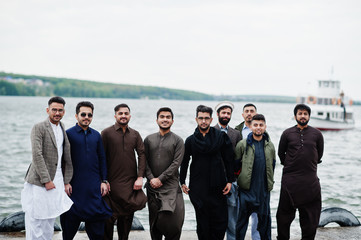 Group of pakistani man wearing traditional clothes salwar kameez or kurta.