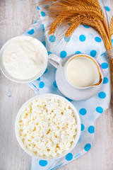 Dairy products on a wooden table.