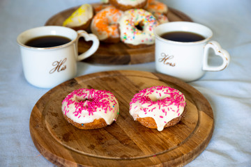 Sweet Donuts And Two Cups Of Coffee