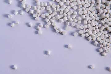 Polypropylene granule close-up background texture. plastic resin ( Masterbatch).Grey chemical...