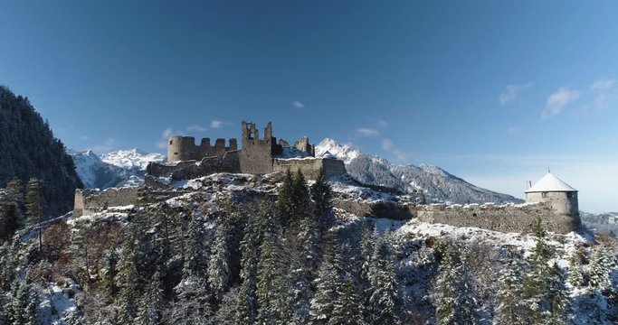 Ehrenberg Castle in winter with Austrian Alps revealed in background