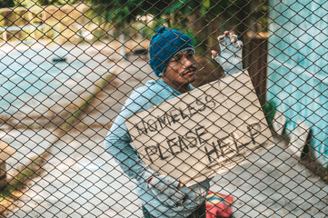 Beggars that stick to the grill with homeless messages please help.