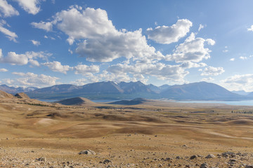 Fototapeta na wymiar Landscape of valley in rolling hills of Western Mongolian steppe