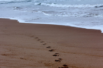 footprints on the beach