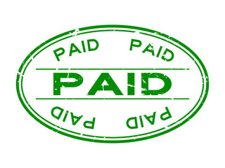 Grunge green paid word oval rubber seal stamp on white background