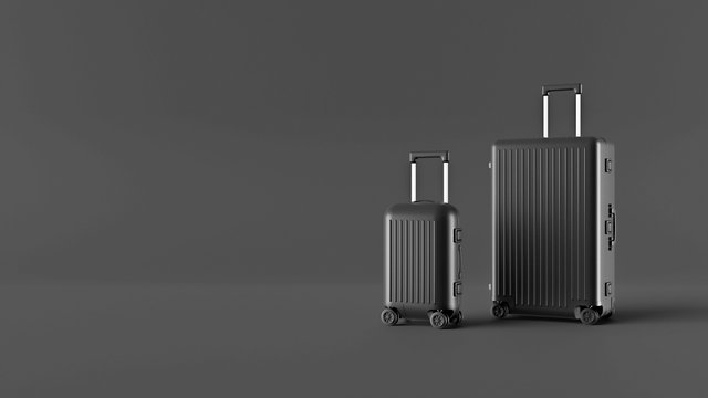 Vacation luggage concept, dark grey room, minimalist travel background with space for text. Black baggage mockup, suitcase bag, wheeled design mock up, travel luggage plastic bag. Tourism traveling.
