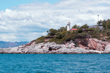 Fototapeta na wymiar Lighthouse in Fethiye Turkey on rocky coast
