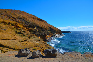 A beautiful hill with a coast, Montana Amarilla, Tenerife, Canary Island, Spain - obrazy, fototapety, plakaty