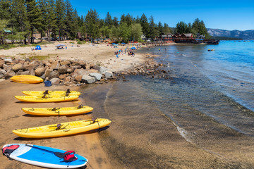 Fototapeta na wymiar Beach kayaks in Lake Tahoe, California