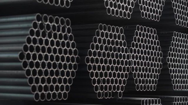 Metal tubing stock pile in factory