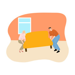 Young couple moving furniture in their new apartment
