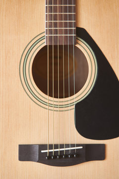 Acoustic guitar. Musical instrument. Close-up. 