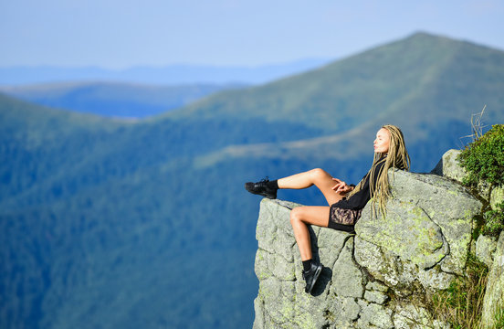 halt finally. woman on mountain cliff. feel freedom. extremely free. alpinism lifestyle. way to success. mountain traveling and hiking. rock climbing skill. mountaineering lover. reaching the top