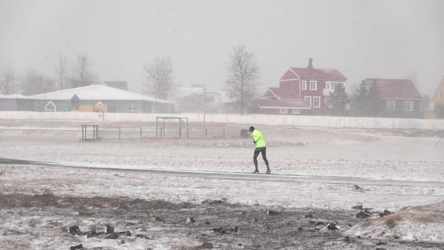  Jogger In Blizzard Reykjavik Iceland Neighborhood Slow Motion.mov